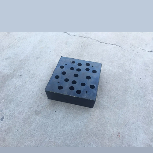 Rubber dock bumper showing solid rubber block construction